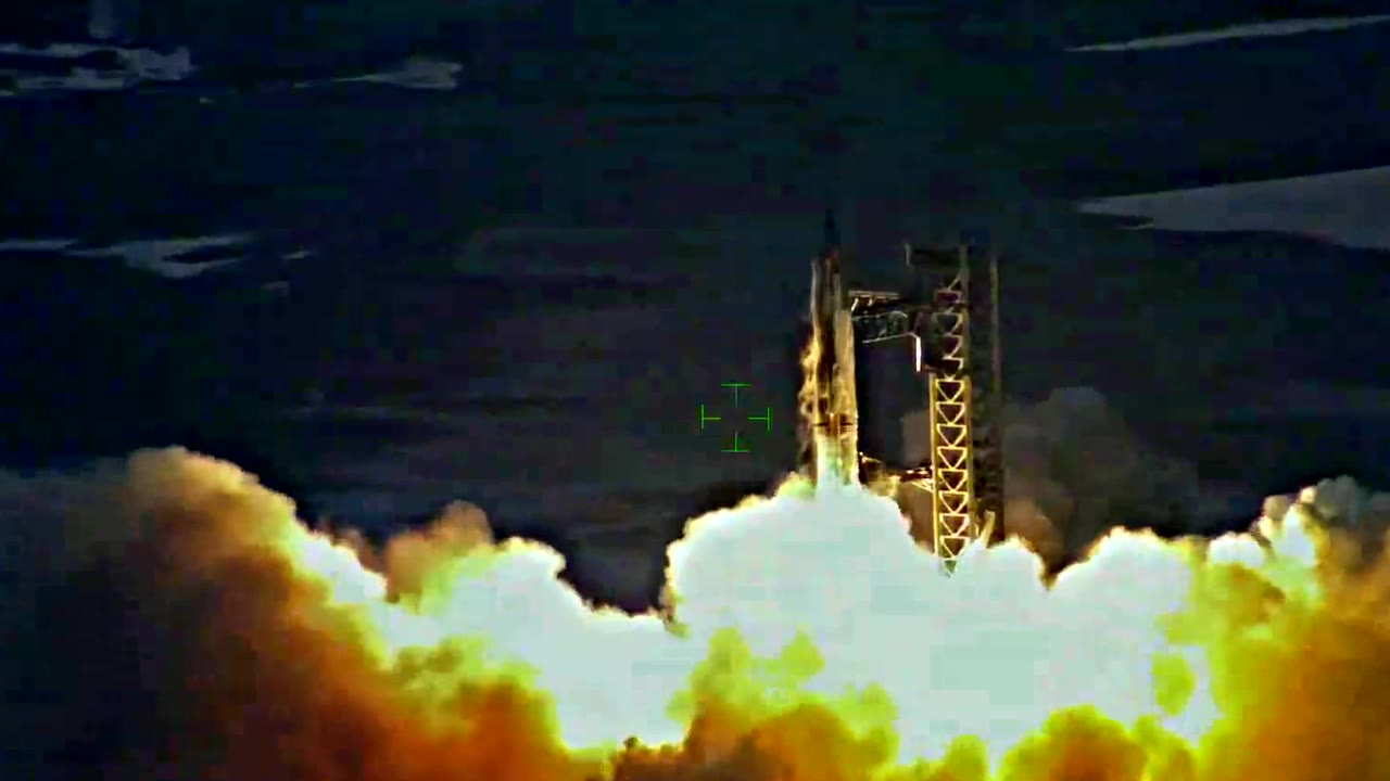 Starship lifting off from Starbase seen from above, the pad engulfed in exhaust, October 13 2024